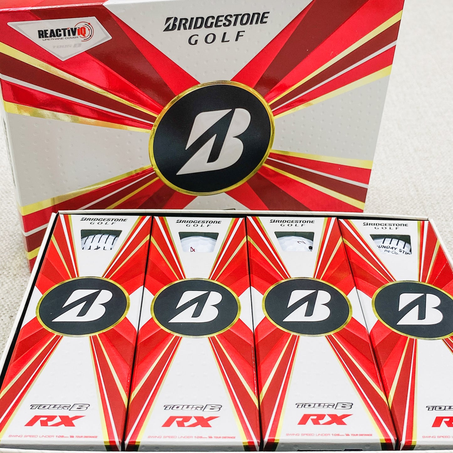 2022 Bridgestone Tour B-RX (white) - 2 x dozen, brand new. Sunday Sticks logo.