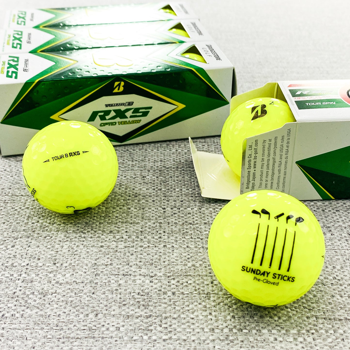 2022 Bridgestone Tour B-RXS (yellow) - 2 x dozen, brand new. Sunday Sticks logo.